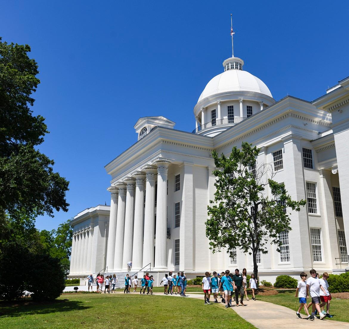 A school group walks the grounds of the Alabama State Capitol in Montgomery, Ala., on May 15. (Julie Bennett/Getty Images)