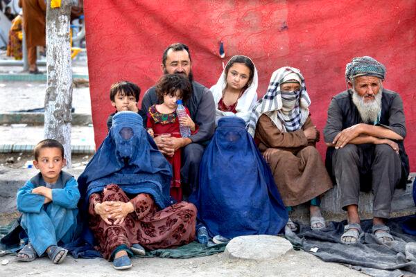 An Afghan family at a makeshift camp in Kabul on Aug. 12, 2021. (Paula Bronstein/Getty Images)