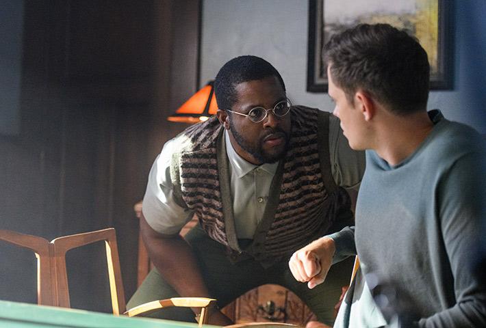Will (Winston Duke, L) presents Kane (Bill Skarsgard) with a hypothetical, ethical dilemma, in “Nine Days.” (Michael Coles/Sony Pictures Classics)