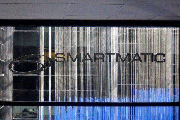 The corporate logo of Smartmatic is seen at its offices in Caracas, Venezuela, on Aug. 2, 2017. (Christian Veron/Reuters)