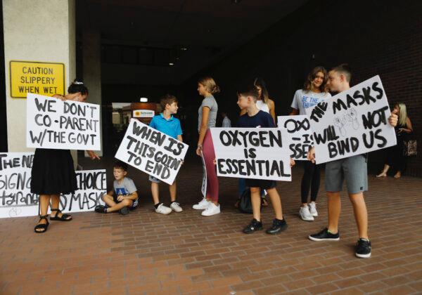Families protest any potential mask mandates before the Hillsborough County Schools Board meeting held at the district office on July 27, 2021, in Tampa, Florida. (Octavio Jones/Getty Images)