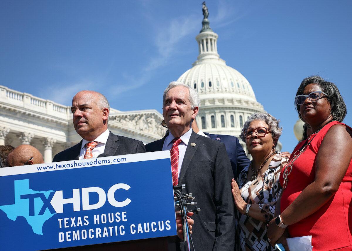 Texas State Democrats (L-R) Democratic Chair Rep. Chris Turner (TX-101), Rep. Rafael Anchia (TX-103), Rep. Senfronia Thompson (TX-141), and Rep. Rhetta Bowers (TX-113) at a news conference outside the U.S. Capitol on July 13, 2021. More than 60 Texas House Democrats left the state to Washington to block a voting reform bill by denying a Republican quorum. (Kevin Dietsch/Getty Images)