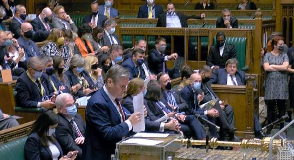 Labour MPs sit behind their leader Kier Starmer during a debate in the House of Commons on Aug. 18, 2021. (Parliament TV)