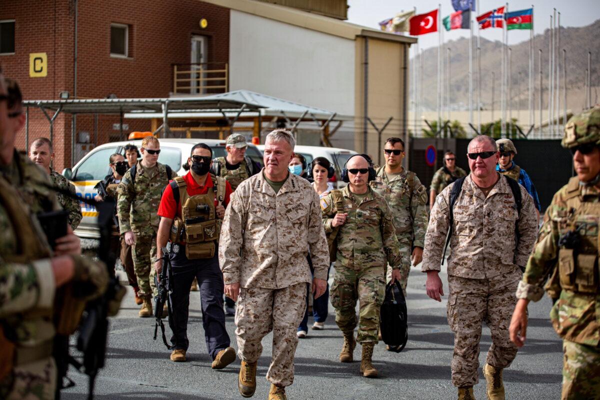 Commanding General U.S. Central Command Kenneth F. McKenzie tours an evacuation control center at Hamid Karzai International Airport, Afghanistan, on Aug. 17, 2021. (U.S NAVY/Central Command Public Affairs/LT. Mark Andries via Reuters)