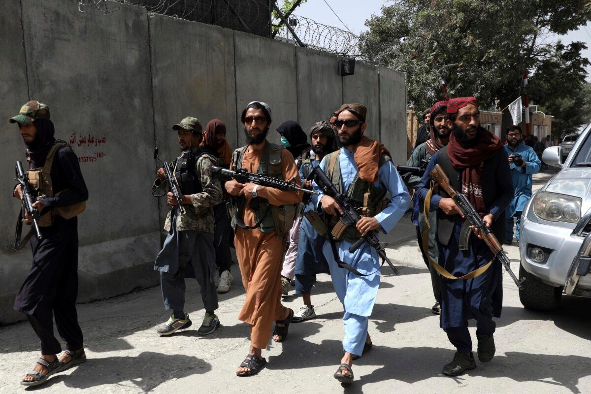 Taliban terrorists patrol in a neighborhood in Kabul, Afghanistan, on Aug. 18, 2021. (Rahmat Gul/AP Photo)