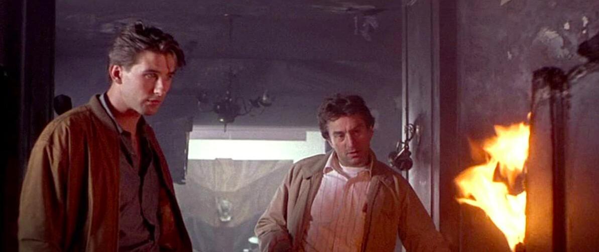 Brian McCaffrey (William Baldwin, L) and Shadow (Robert De Niro), in “Backdraft.” (Universal Pictures)
