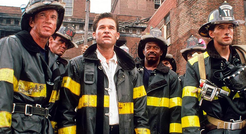 (L–R, front) Scott Glenn, Kurt Russell, and William Baldwin star in “Backdraft.” (Universal Pictures)