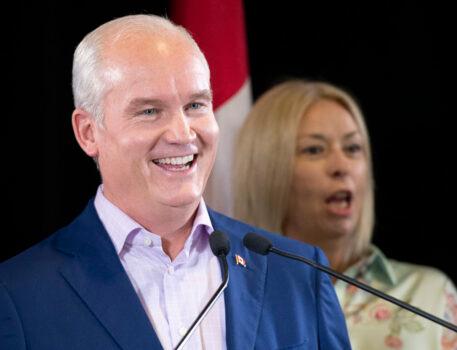 Conservative Leader Erin O'Toole Leader smiles while answering a reporter during a news conference in Levis, Que., on Aug. 14, 2021. (The Canadian Press/Jacques Boissinot)