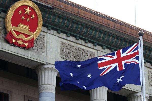 A general view of an Australian flag is seen during a welcome ceremony for Australia's Prime Minister Julia Gillard outside the Great Hall of the People on April 9, 2013, in Beijing, China. (Photo by Feng Li/Getty Images)