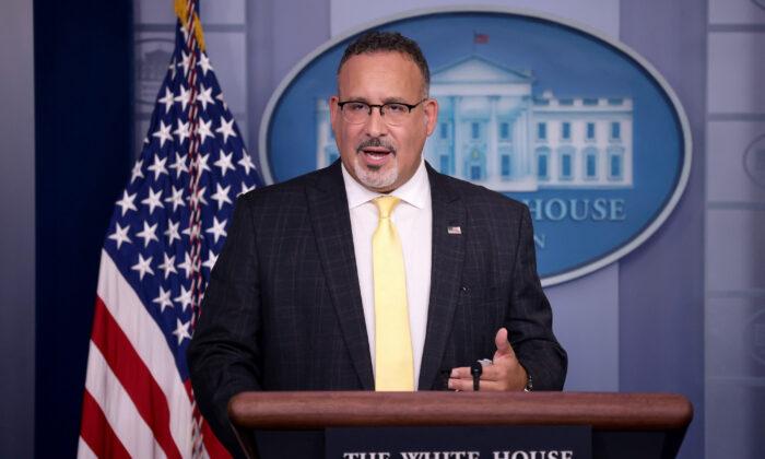Secretary of Education Miguel Cardona answers questions at the White House on Aug. 5, 2021. (Win McNamee/Getty Images)