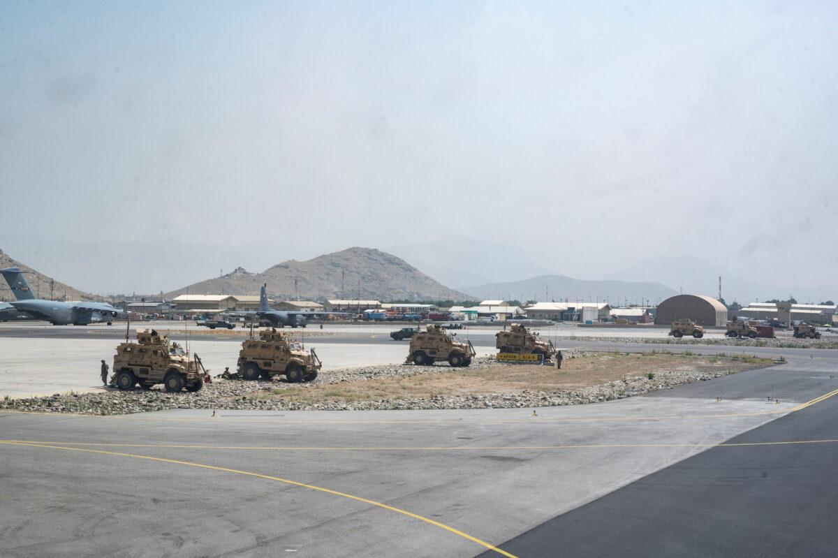 U.S. Army soldiers assigned to the 82nd Airborne Division patrol Hamid Karzai International Airport in Kabul, Afghanistan, on Aug. 17, 2021. (U.S. Air Force/Senior Airman Taylor Crul via Reuters)