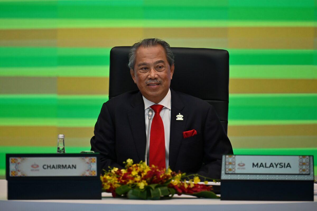Malaysia's former Prime Minister Muhyiddin Yassin takes part in the online Asia-Pacific Economic Cooperation (APEC) leaders' summit in Kuala Lumpur on Nov. 20, 2020. (Mohd Rasfan/AFP via Getty Images)