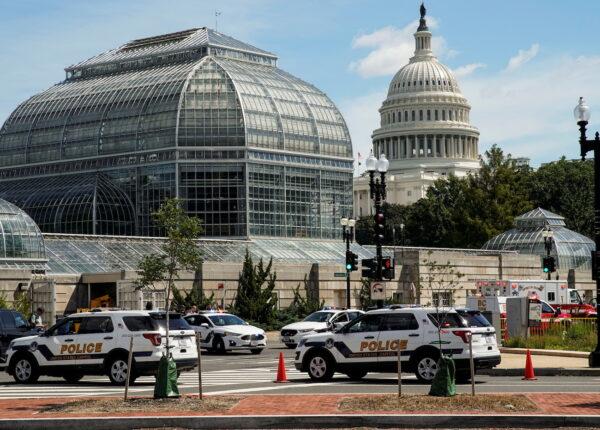 U.S. Capitol Police vehicles and other emergency vehicles respond as police investigated reports of a suspicious vehicle near the U.S. Capitol in Washington, on Aug. 19, 2021. (Elizabeth Frantz/Reuters)