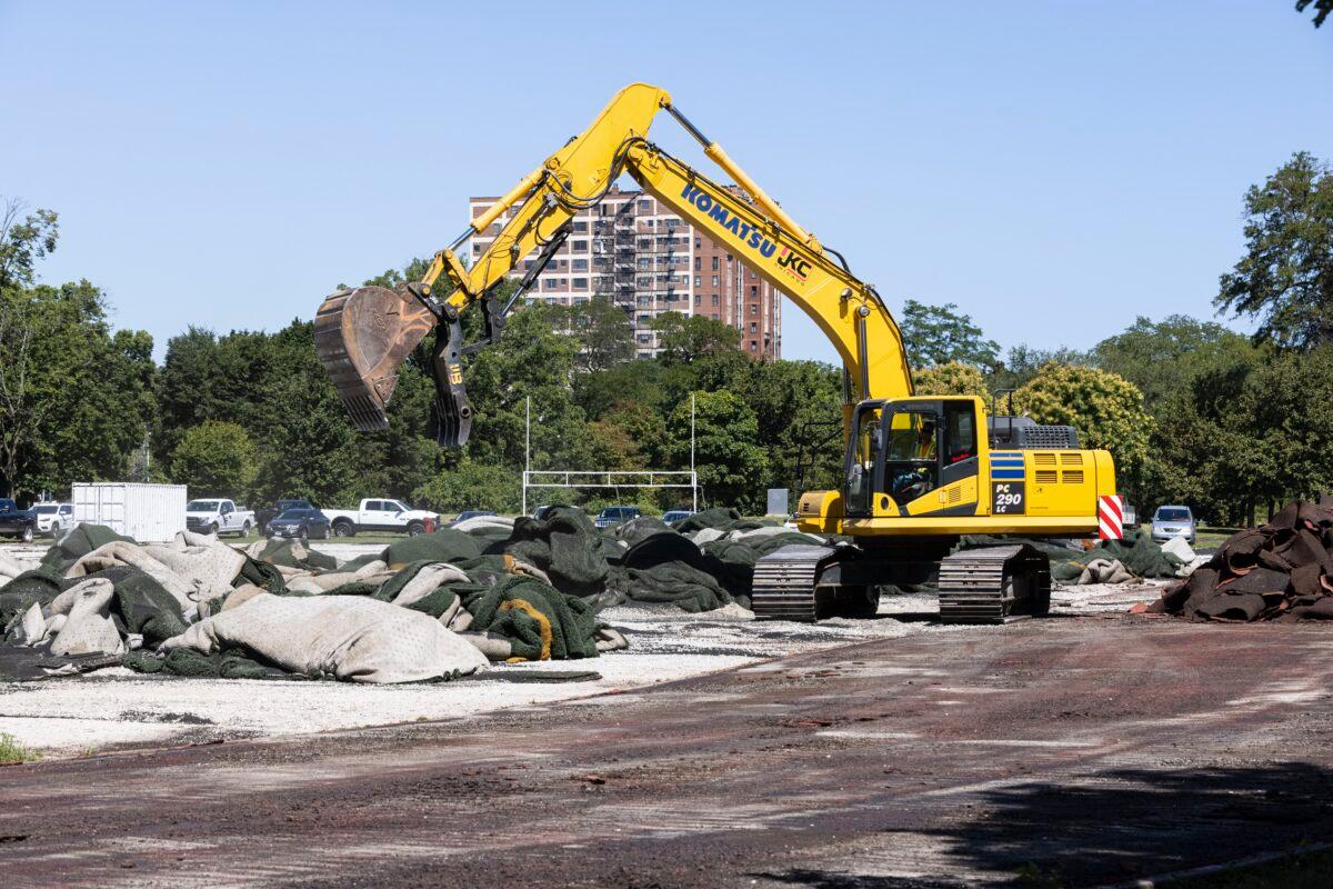Construction crews tear up the turf field and track in Jackson Park starting construction on The Barack Obama Presidential Center in Chicago on Aug. 16, 2021. (Anthony Vazquez/Chicago Sun-Times via AP)