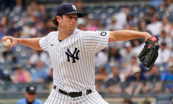 Cole Pitches Streaking Yanks Past Twins; Sunday’s Game PPD