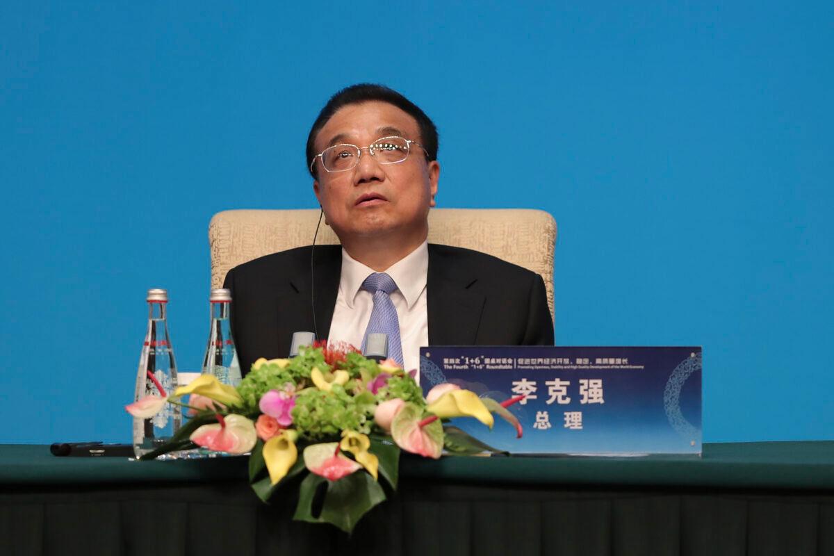Chinese Premier Li Keqiang participates in a press conference at Diaoyutai State Guest House in Beijing, China, on Nov. 21, 2019. Li revealed at a press conference on May 28, 2020, that roughly 600 million Chinese citizens only earn 1,000 yuan, or roughly $140, a month. (Lintao Zhang/Getty Images)