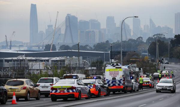 NSW Police perform roadside checks before anti-lockdown protests along the City West Link at Lilyfield in Sydney, Australia, on Aug. 21, 2021. (Lisa Maree Williams/Getty Images)