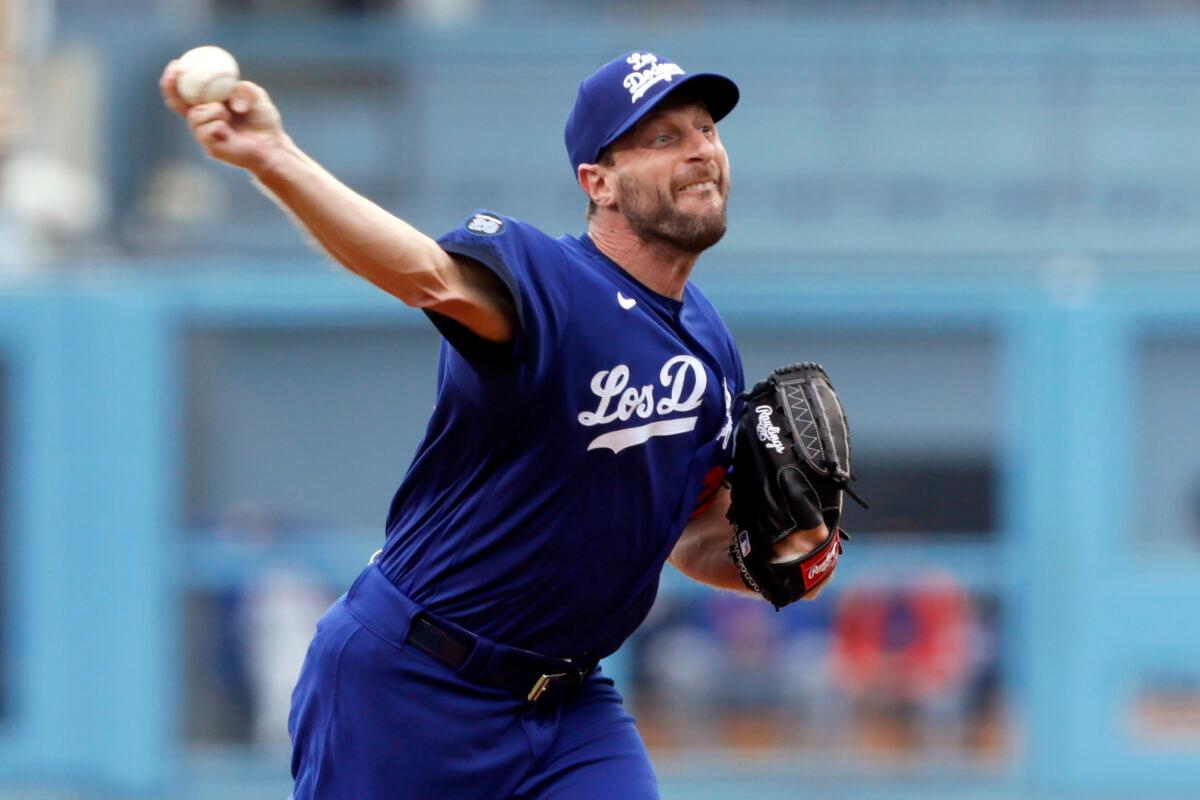 Los Angeles Dodgers starting pitcher Max Scherzer throws to a New York Mets batter during the first inning of a baseball game in Los Angeles, Saturday, Aug. 21, 2021. (AP Photo/Alex Gallardo)