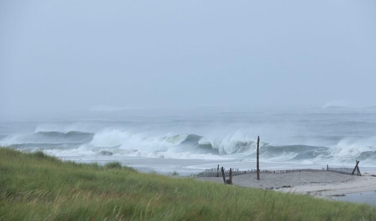 Waves hit the shore at Ponquogue Beach as Hurricane Henri, now downgraded to a tropical storm, nears the coast in Long Island, N.Y., on Aug. 22, 2021. (Caitlin Ochs/Reuters)