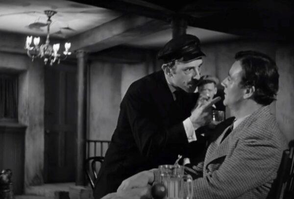 Axel (John Qualen, L) looking out for Ole (John Wayne), in “The Long Voyage Home.” (United Artists)