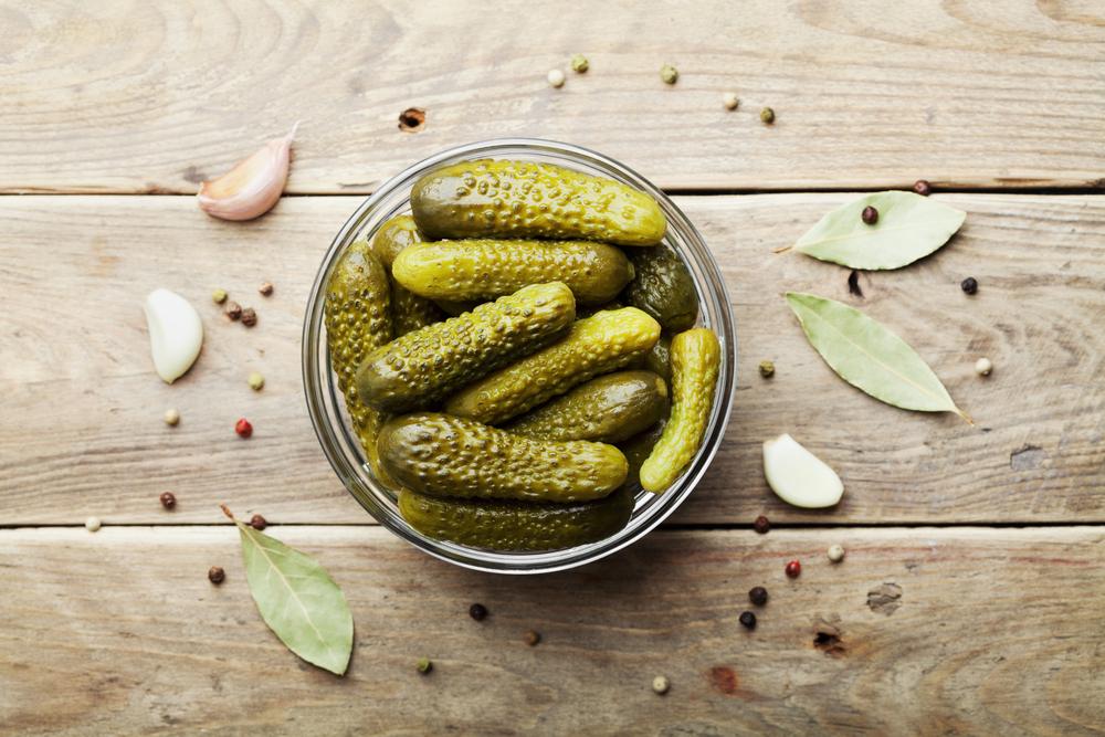 Your pickles should taste pleasantly sour when they’re ready; that might be as little as a week if you prefer a light sourness, or as long as a month if you prefer a more robust flavor. (Julia Sudnitskaya/Shutterstock)