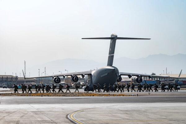 U.S. soldiers, assigned to the 82nd Airborne Division, arrive to provide security in support of Operation Allies Refuge at Hamid Karzai International Airport in Kabul, Afghanistan, on Aug. 20, 2021. (Senior Airman Taylor Crul/U.S. Air Force/Handout via Reuters)