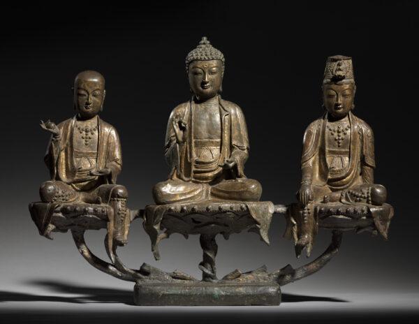 The "Amitabha Triad," 1400s, by an unknown artist of the Joseon Dynasty (1392–1910), Korea. Bronze with traces of gilding; 16 inches by 6 1/2 inches by 21 1/2 inches. Worcester R. Warner Collection, the Cleveland Museum of Art. (Public Domain)