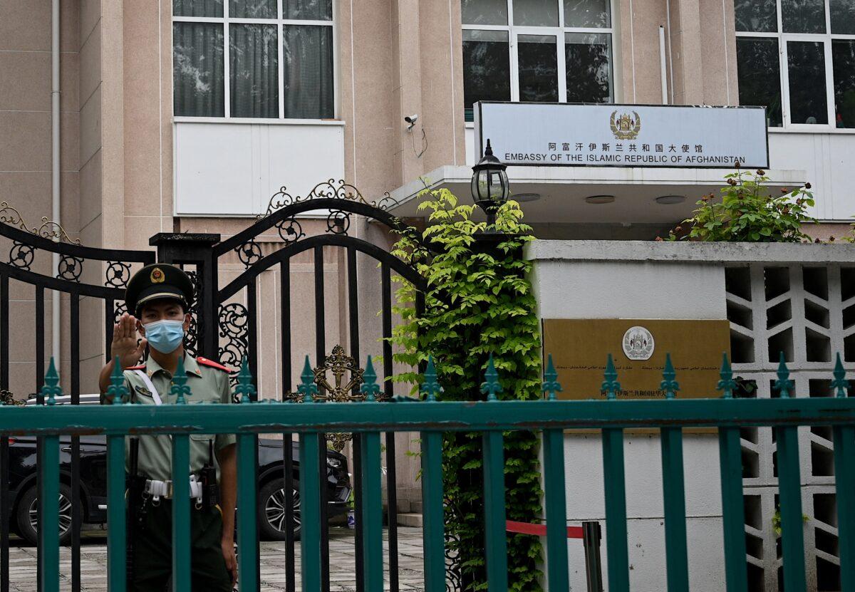 A Chinese paramilitary police stands guard outside the Afghanistan embassy in Beijing on Aug. 16, 2021. (Noel Celis/AFP via Getty Images)