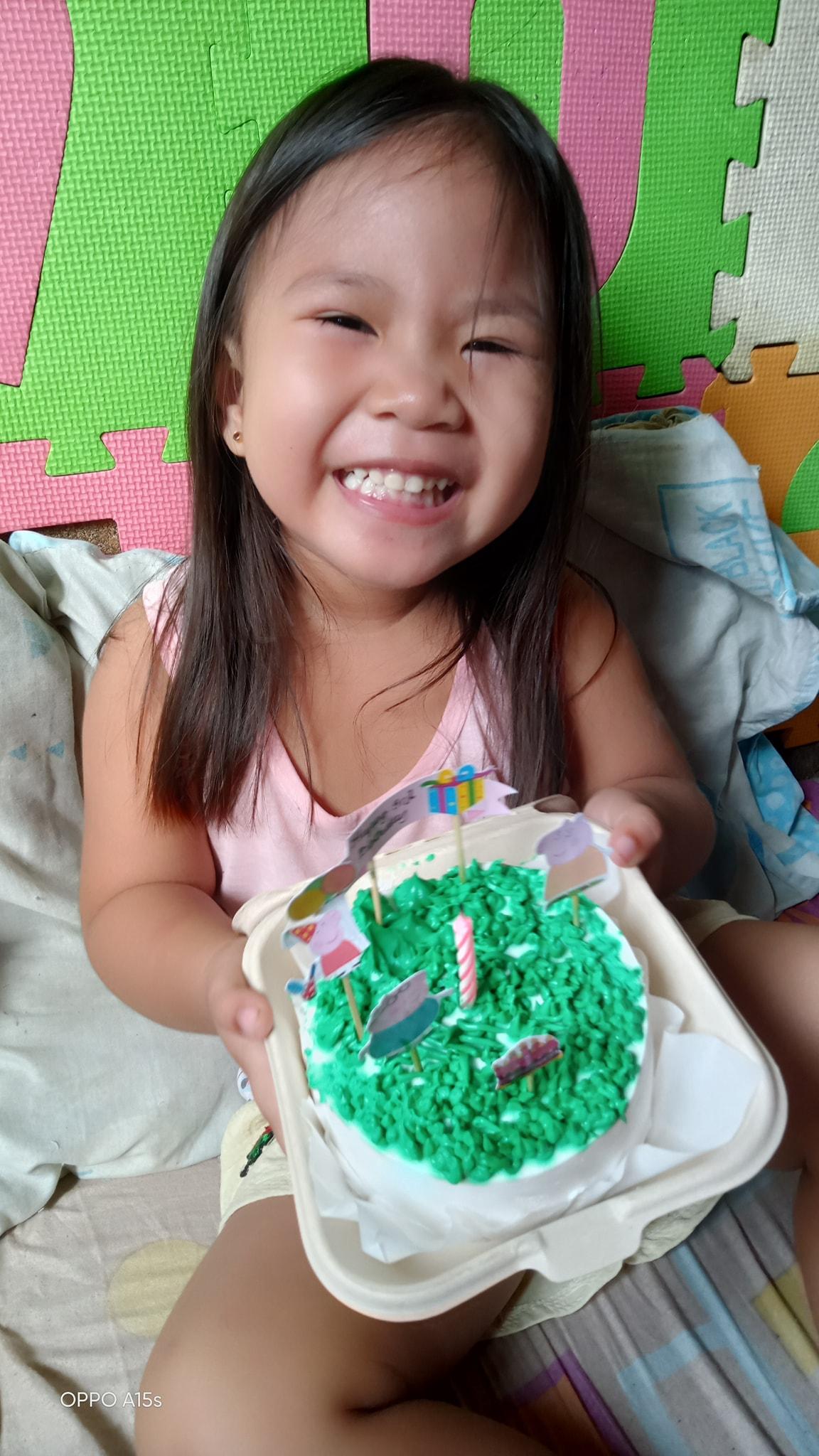 Rochelle's daughter with her Peppa Pig cake. (Courtesy of <a href="https://www.facebook.com/rochelle.tanael.9">Rochelle Reyes</a>)