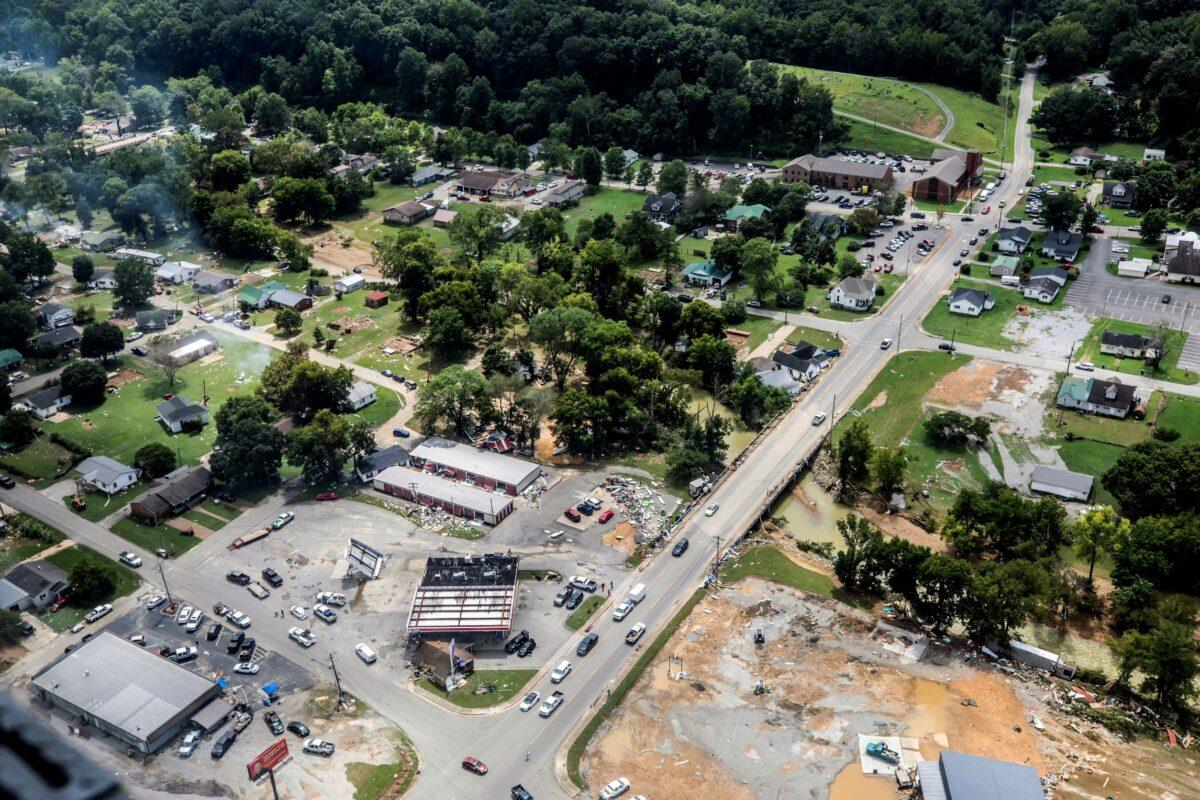 Flood damage is photographed from a Tennessee National Guard UH-60 Black Hawk helicopter flying Gov. Bill Lee to Waverly, Tenn., on Aug. 22, 2021. (Alan Poizner/The Tennessean via AP)