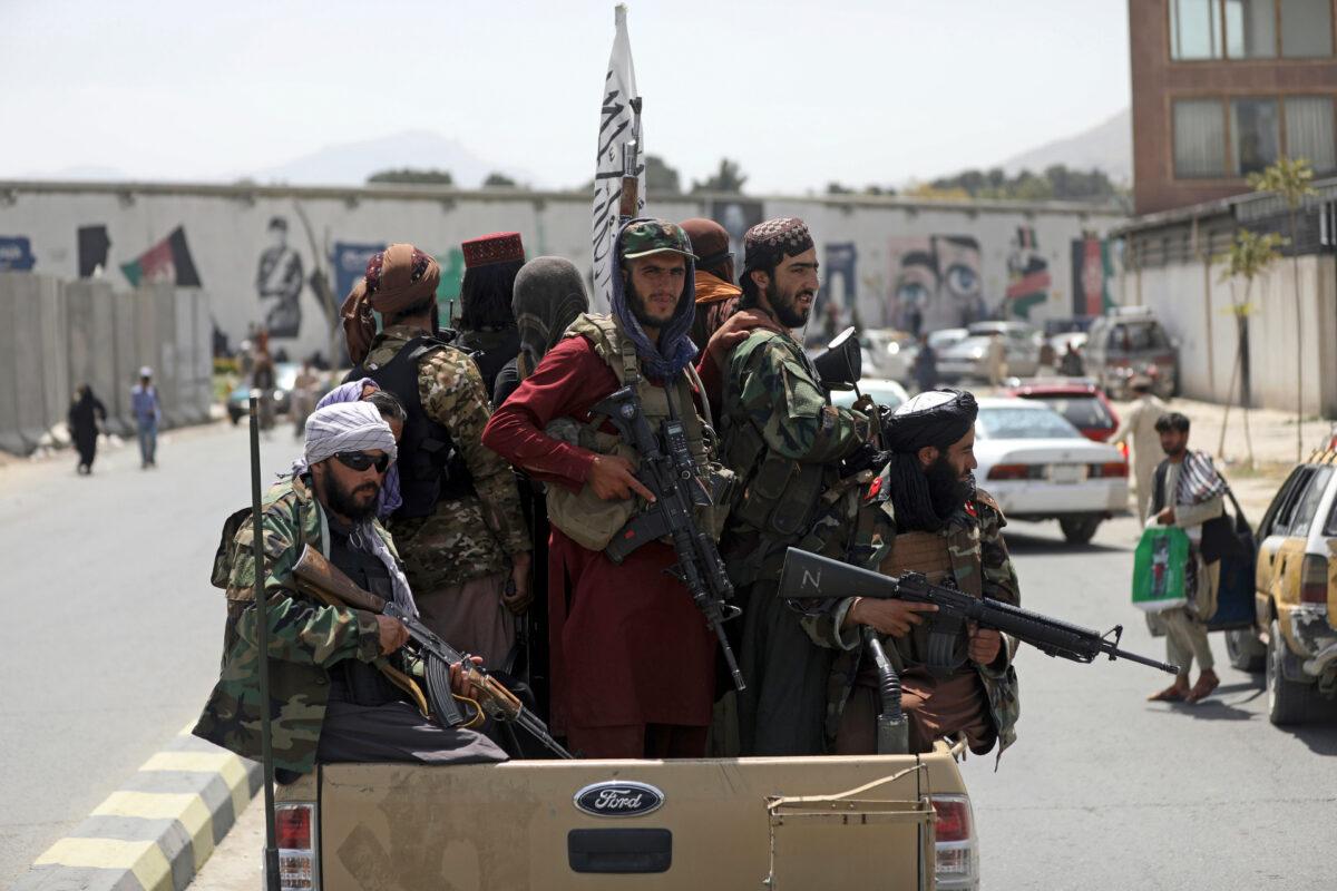 Taliban terrorists patrol in Kabul, Afghanistan on Aug. 19, 2021. (Rahmat Gul/AP Photo)