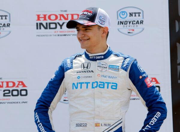 Alex Palou smiles in victory lane after placing third in an IndyCar race at Mid-Ohio Sports Car Course in Lexington, Ohio, on July 4, 2021. (Tom E. Puskar/AP Photo)
