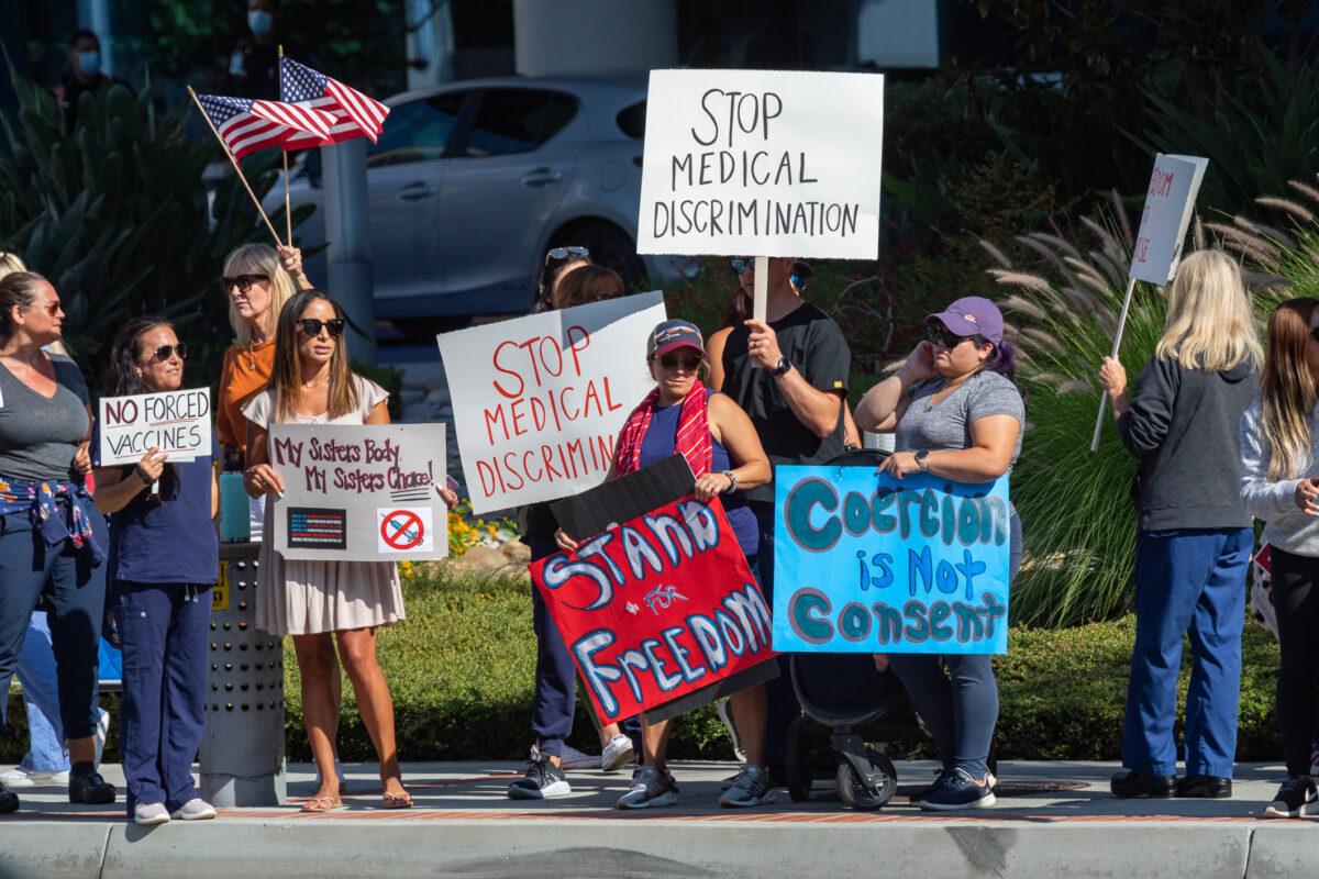Medical personnel protest mandatory vaccines in Orange, Calif., on Aug. 9, 2021. (John Fredricks/The Epoch Times)