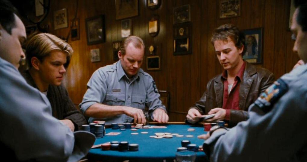 (L–R) David Zayas, Matt Damon, Brian Donahue, Edward Norton, and Salvatore Cavaliere in a hustlers versus state troopers poker game in “Rounders." (Miramax)
