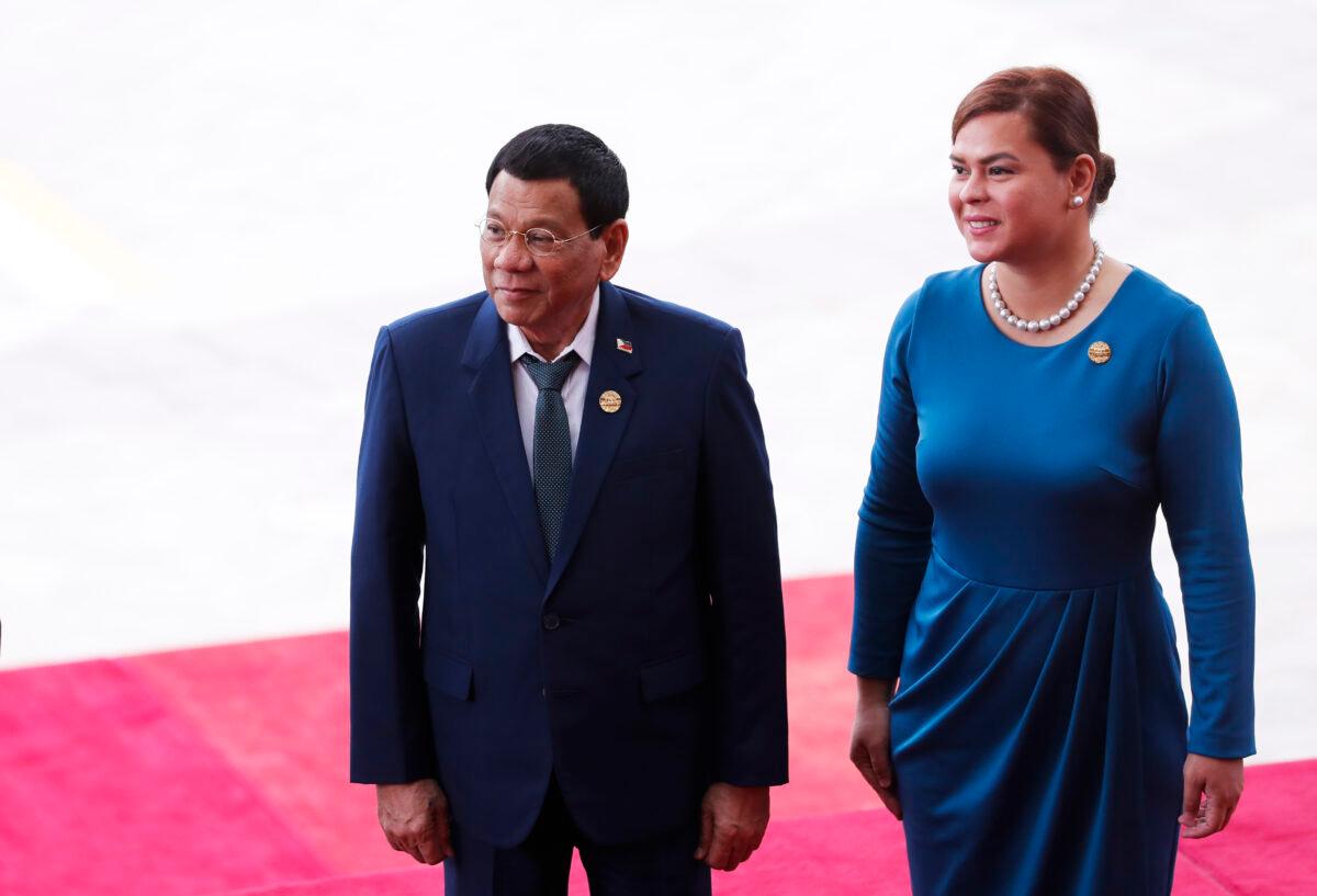 Philippine President Rodrigo Duterte (L) and his daughter Sara Duterte arrive for the opening of the Boao Forum for Asia (BFA) Annual Conference in Boao, Hainan province, China, on April 10, 2018. (AFP via Getty Images)