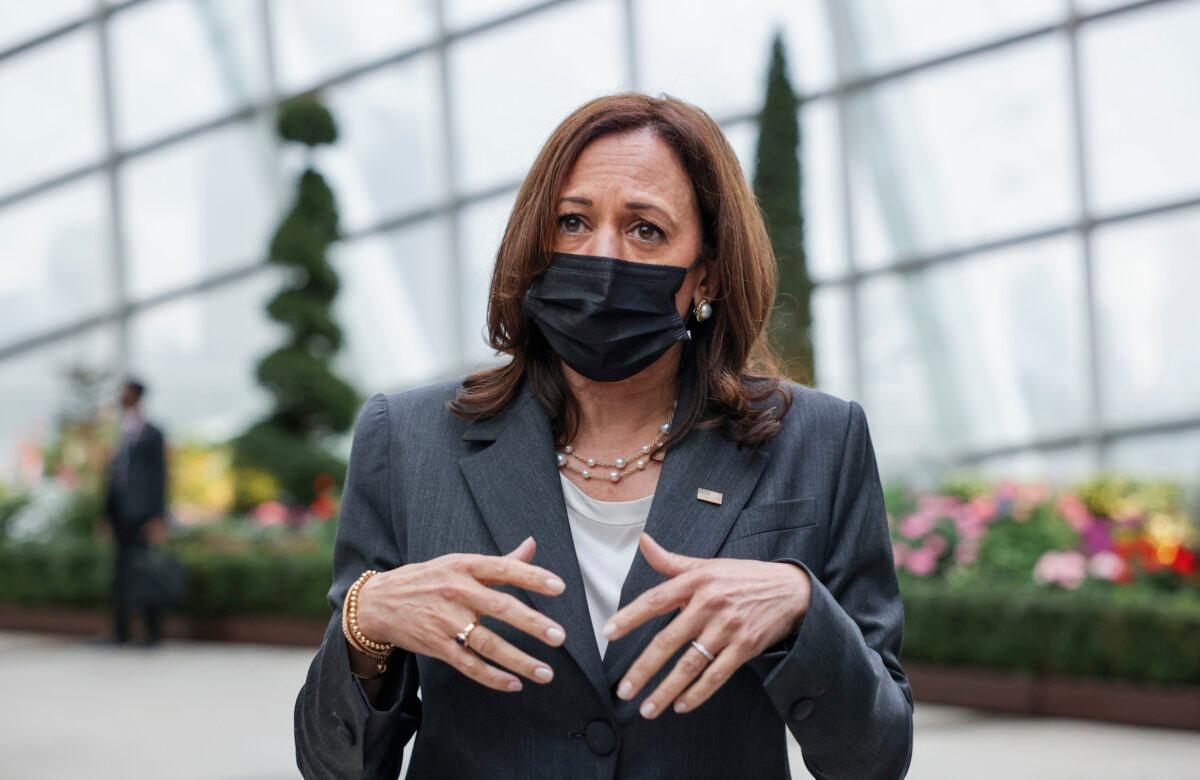 United States Vice President Kamala Harris takes questions from reporters as she visits the Flower Dome at Gardens by the Bay, following her foreign policy speech in Singapore, on Aug. 24, 2021. (Evelyn Hockstein/Pool Photo via AP)