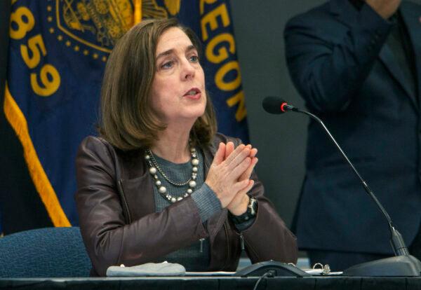 Outgoing Oregon Gov. Kate Brown has been accused of being soft of crime. She is pictured in this file photo taken on Nov. 10, 2020. (Cathy Cheney/AP)