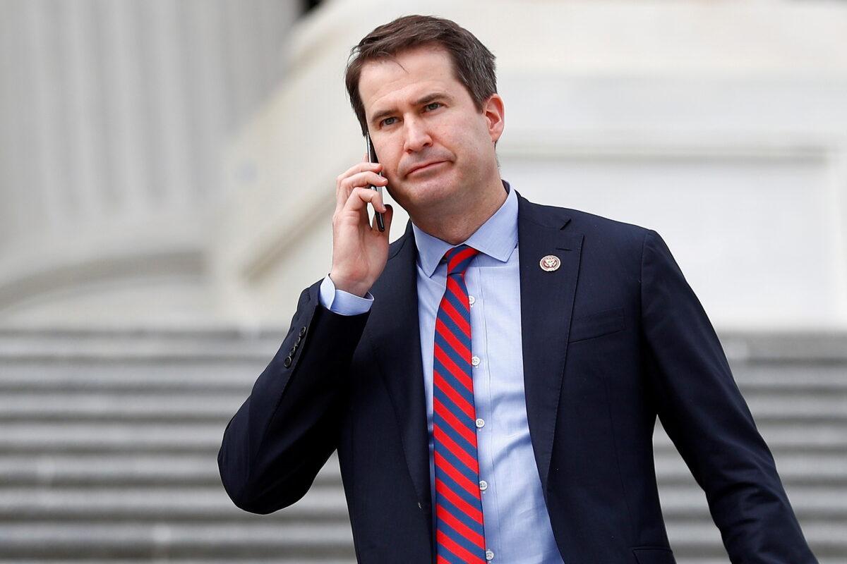 Rep. Seth Moulton (D-Mass.) descends down the House entrance stairs following the Friends of Ireland reception on Capitol Hill in Washington on March 12, 2020. (Tom Brenner/Reuters)
