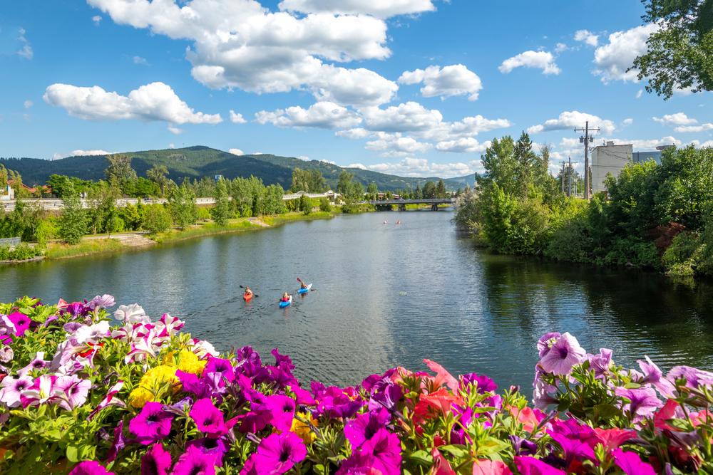 A group of kayakers enjoys a beautiful summer day on the Sand Creek River and Pend Oreille Lake in Sandpoint, Idaho. (Kirk Fisher/Shutterstock)
