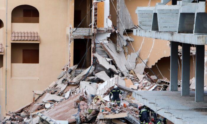 Spanish Rescuers Pull Body From Collapsed Building, One Still Missing