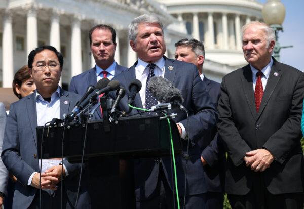 Rep. Michael McCaul (R-Texas), joined by a bipartisan group of lawmakers, speaks at a news conference on the ongoing Afghanistan evacuations, at the U.S. Capitol in Washington, on Aug. 25, 2021. (Kevin Dietsch/Getty Images)