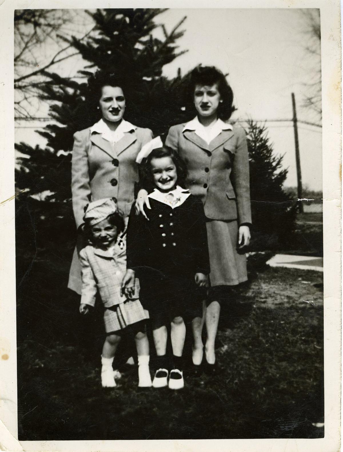 The author (Center) with her older sisters Florence and Rita, and younger niece Rose-Marie. (Courtesy of Eleanor Furlong)