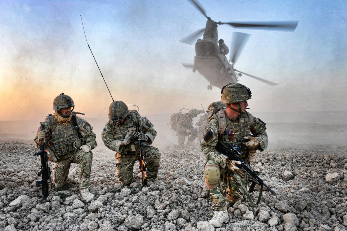 An air insertion operation mounted by British soldiers and Afghan police in Afghanistan, in an undated handout photo. (MoD/PA)