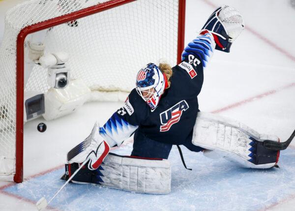 Goalie Alex Cavallini, of the United States, can't stop a goal from Canada during second period IIHF Women's World Championship hockey action in Calgary,on Aug. 26, 2021.(Jeff McIntosh/The Canada Press)