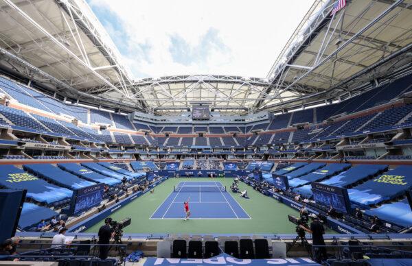 A general view of Arthur Ashe Stadium is seen as Dominic Thiem of Austria serves the ball in the first set during his Men's Singles final match against Alexander Zverev of Germany on Day 14 of the 2020 U.S. Open at the USTA Billie Jean King National Tennis Center in the Queens borough of New York on Sept. 13, 2020. (Al Bello/Getty Images)
