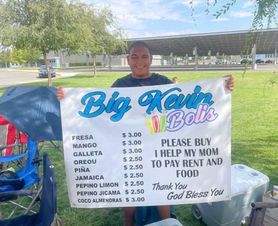 Kevin Giovanni Esparza with his ice-pop signboard. (Courtesy of <a href="https://www.instagram.com/big_kevin_ice_pops/">Kevin Giovanni Esparza</a>)
