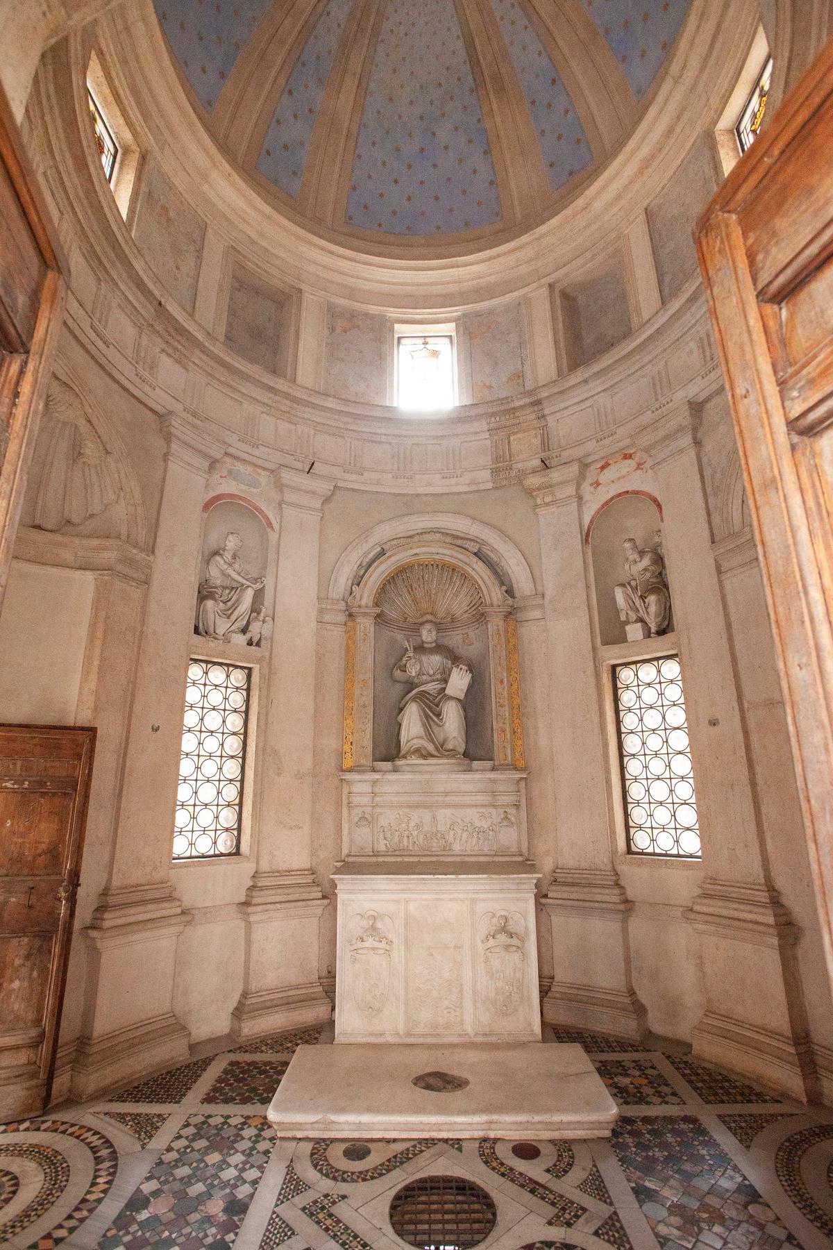Inside, the statue of St. Peter is centrally positioned. The circle in the center of the room is meant to mark the exact spot of St. Peter's martyrdom. (JHSmith/The Epoch Times)
