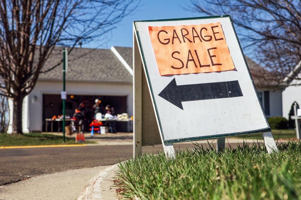 At the very least, put a sign at the end of your street. If you really want to attract motivated buyers, get serious about the advertising.(Suzanne Tucker/Shutterstock)