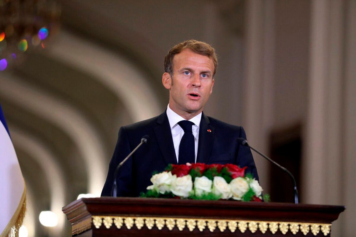 French President Emmanuel Macron holds a press conference following his meeting with Iraqi President Barham Salih during the Baghdad Conference for Cooperation and Partnership, in the Presidential Palace, Baghdad, Iraq, on Aug. 28, 2021. (Khalid Mohammed/AP Photo)