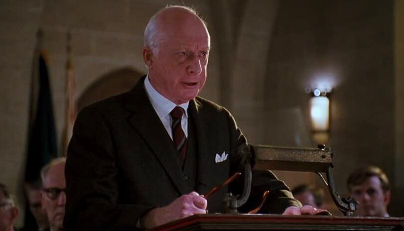 Mr. Nolan (Norman Lloyd), Welton prep school's schoolmaster, warns that there will be a thorough inquiry into the tragic death of Neil Perry, in "Dead Poets Society." (Touchstone Pictures/Warner Bros)